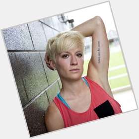 <a href="/hot-women/megan-rapinoe/is-she-retired-injury-married-playing-tonight-left">Megan Rapinoe</a> Athletic body,  salt and pepper hair & hairstyles