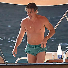 Chris Pine flaunts shirtless physique during boat outing in Italy, skips Toronto Film Festival premiere