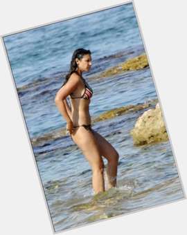 Tatiana Santo Domingo Slim body,  dark brown hair & hairstyles